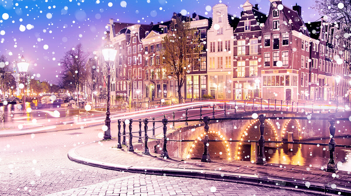 Amsterdamski kanali u predvečer dok snijeg pada, putovanje u Amsterdam, Mondo travel